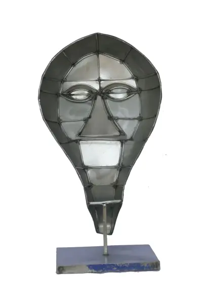 Product image 4 of the product “Small Mask on stand - Modell 3, 53cm height, sculpture from upcyceled oil barrel. ”